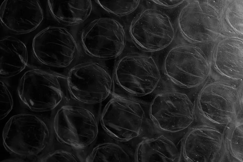 Printed Promises, Packaged Problems: The Custom Print Industry's Hidden Plastic Epidemic